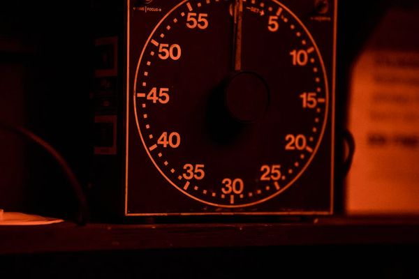 Close up of sports equipment and a digital timer.